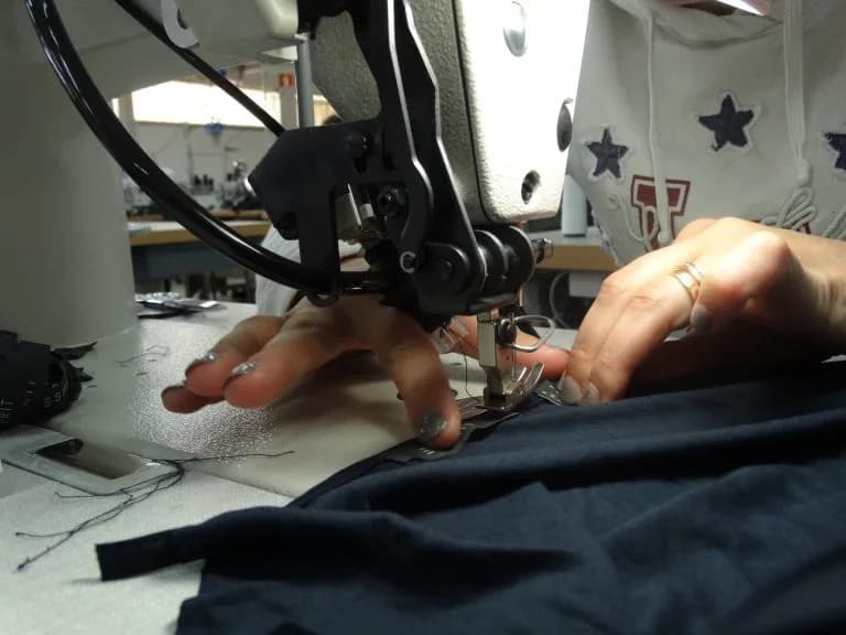 woman sewing clothes